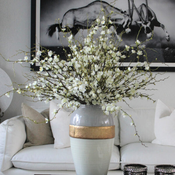 Goddess vase with cherry blossom branches