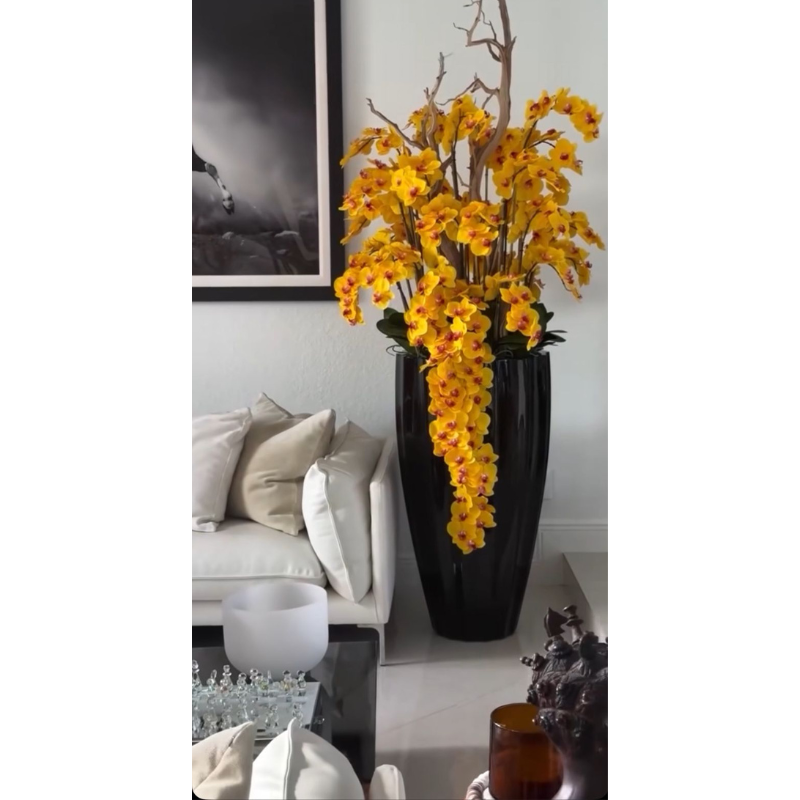 Glossy black San José vase with yellow orchid cascade