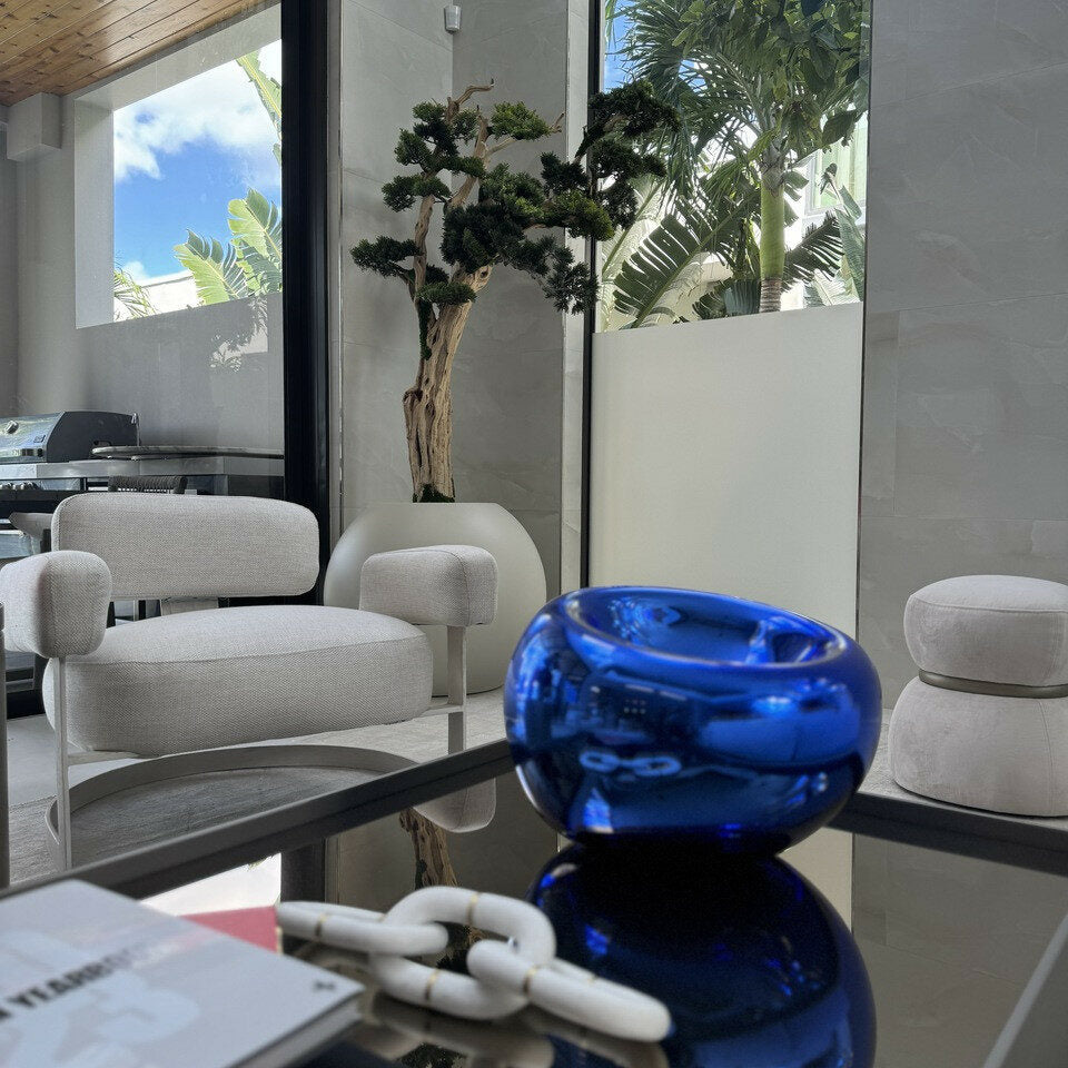 Bonsai tree standing on a 30-inch satin beige ball