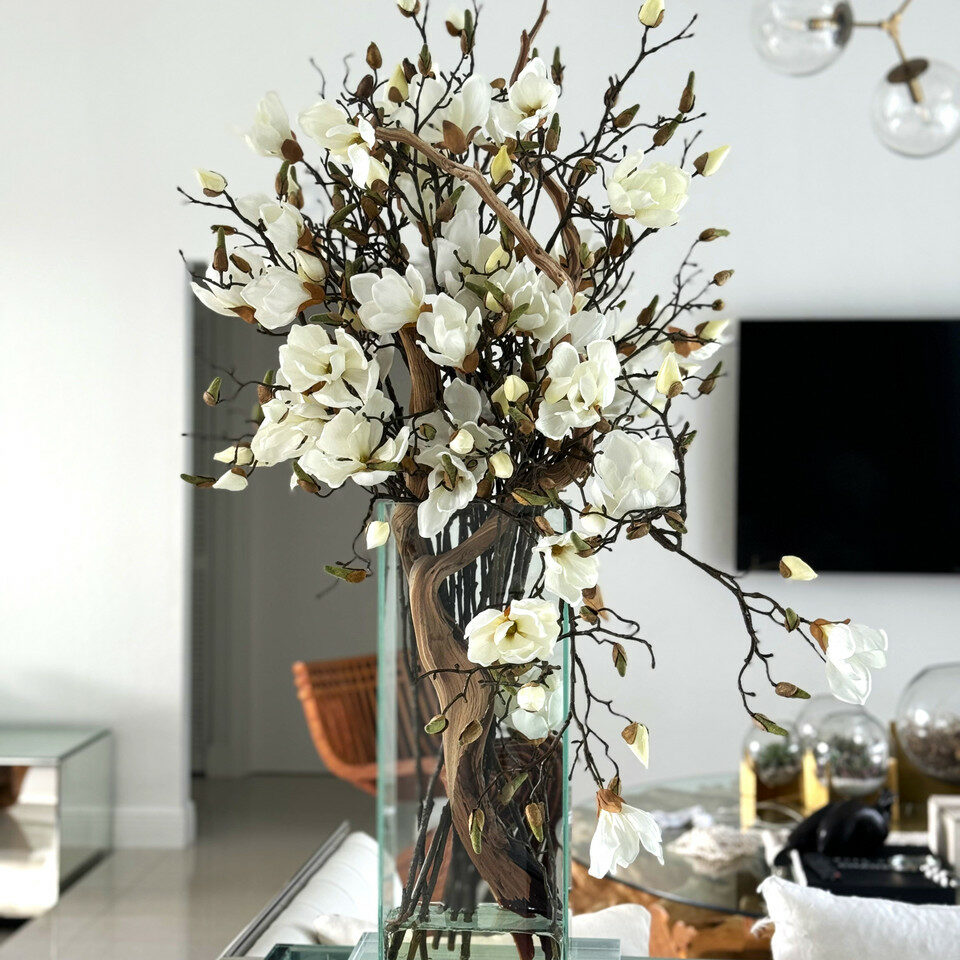 Vase with white magnolias in a modern house 50 cm high