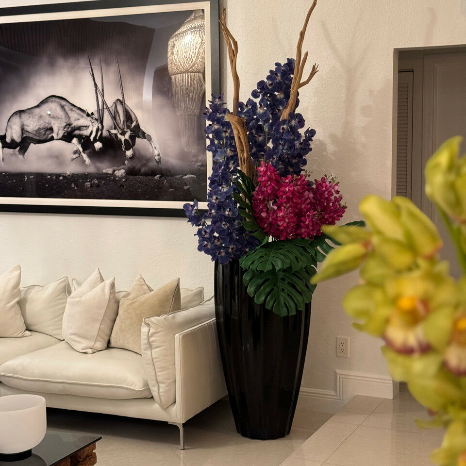 Glossy black San José vase with Vanda orchids