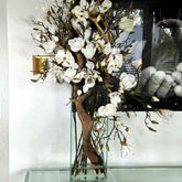 Vase with white magnolias in a modern house 50 cm high