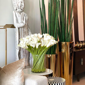 Cala lilies in a 10-inch glass cylinder