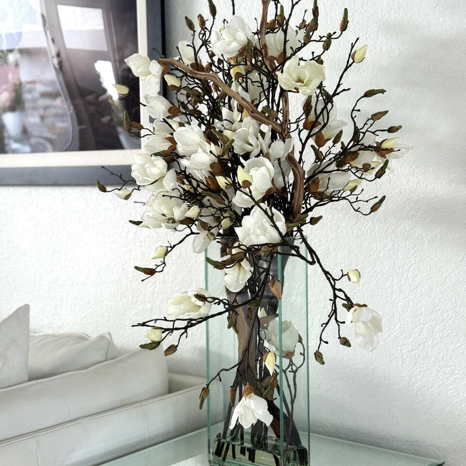 Vase with white magnolias in a modern house 50 cm high