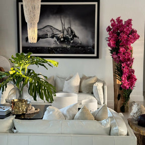 Large teak vase with natural edges and pink Vanda orchids