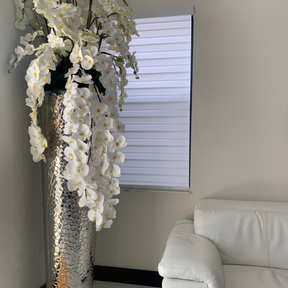 Cascading Phalaenopsis orchids, extra tall hammered vase
