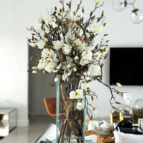 Vase with white magnolias in a modern house 50 cm high