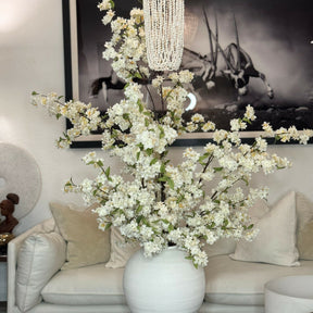 Konos vase with cherry blossoms