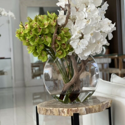 Moon vase with white Vanda orchids and green Cymbidiums